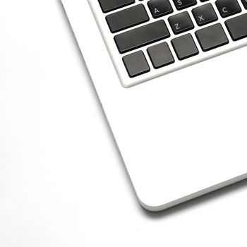 closeup laptop keyboard on white background