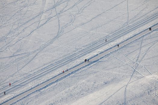Snowy park with cross-country skiing track