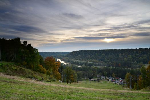 Photo of a sunset in Sigulda, Latvia. Autumn scene. Nature photography.