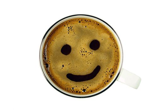 Photo of a cup of coffee. White color cup with a black ring, isolated on white background. A smile is drawn with a coffee foam. View from the top. Food photography.