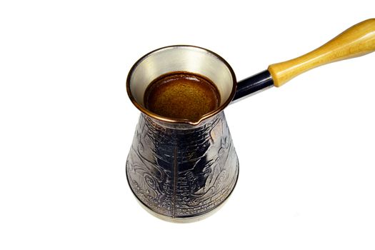 Photo of a turkish coffee brewing pot isolated on white background. Objects photography.