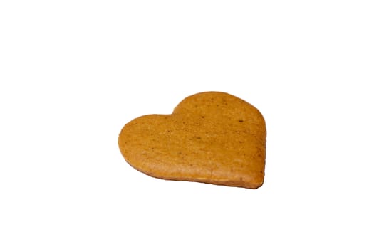 Photo of a gingerbread cookie isolated on white background. Located at a center of a screen. Food photography.