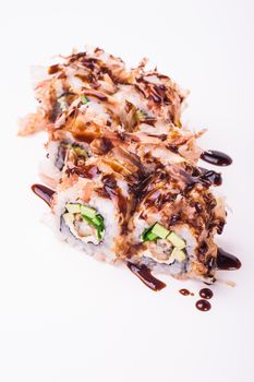 eel sushi roll in tuna flakes isolated on white background 