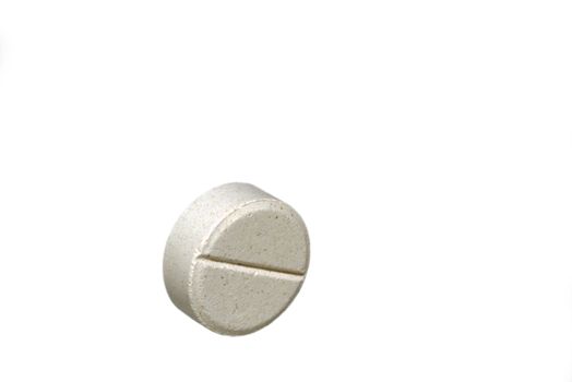 Photo of a white tablet pill isolated on white background. Objects photography. Medicine and healthcare.