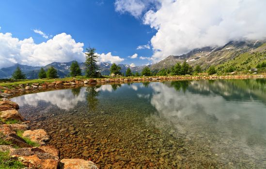 Doss dei Gembri small lake in Pejo Valley, Trentino, Italy