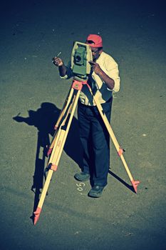 Surveying measuring equipment level transit theodolite on tripod