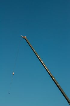 truck crane on the construction site,with blue sky