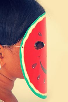 watermelon paper mask on girl face