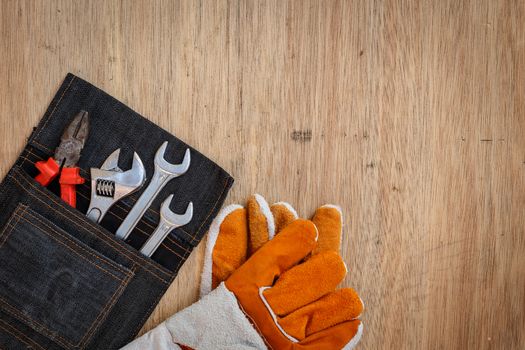 Closeup of assorted work tools on wood