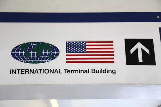 International terminal building direction sign