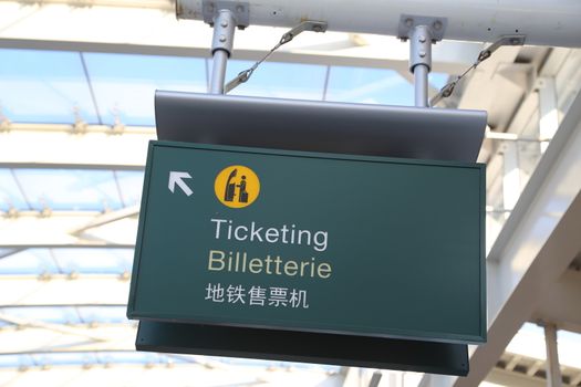 Ticketing sign at airport