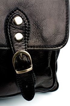 Details of Black Leather Traveling Bag with Pocket and Silver Rivet closeup on white background