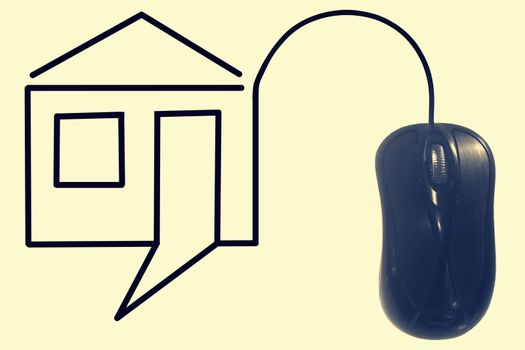House depicted by computer mouse cable