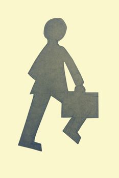 Businessman walking with a briefcase