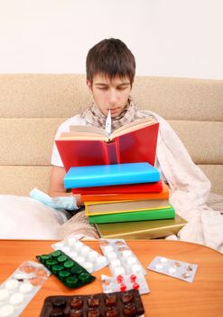 Sick Teenager with the Books on the Sofa