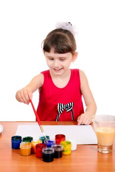 Cheerful Little Girl Drawing Isolated on the white background