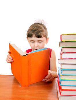 Little Girl with the Books at the Desk on the White Background