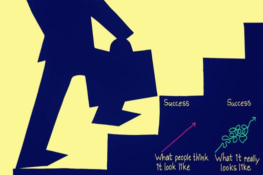 Businessman stepping up a staircase