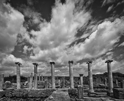 Clouds over the ancient city of Perga in Turkey in black and white