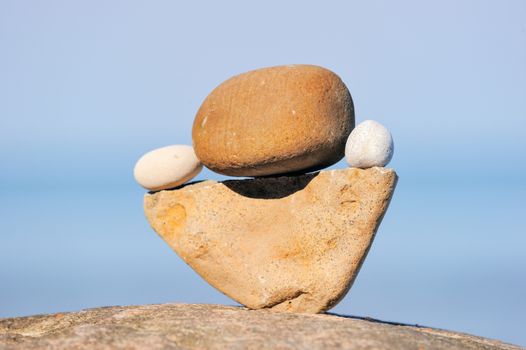 Balancing of stones each other on the seacoast