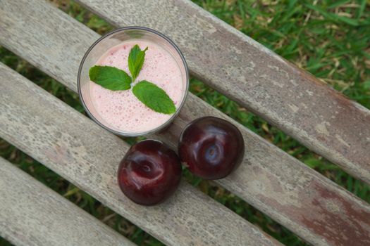 A glass of plum smoothie. Top view