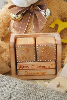 Wooden made calendar with an inscription:"December 25. Merry Christmas!!!"
