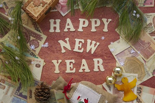 Happy New Year background on a red wooden surface
