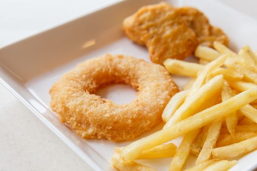 Shrimp fried donuts and french fries