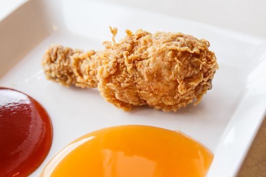 Fried chicken with chili sauce and tomato sauce