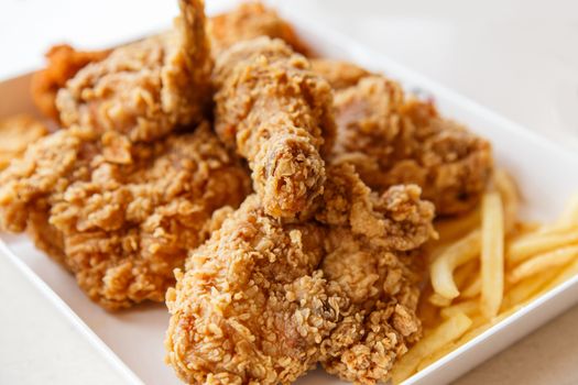 Fried chicken with chili sauce and tomato sauce
