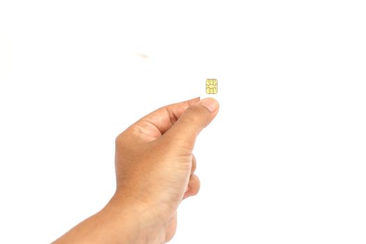 Hand holding sim card and put into smartphone isolated on white background