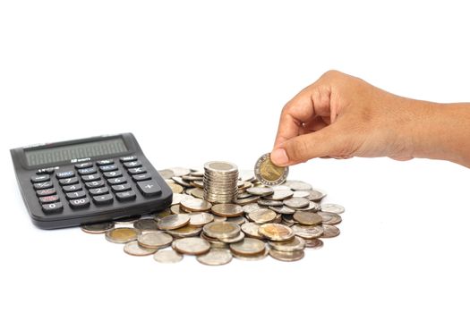 Hand holding coin with calculator isolated on white background