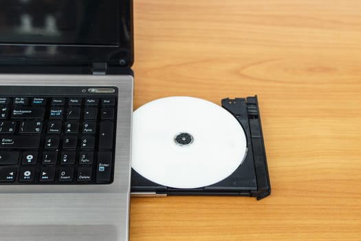 Laptop with open CD - DVD drive