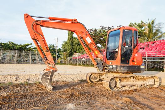 Excavator stand in construction site