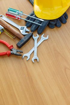 Closeup of assorted work tools on wood