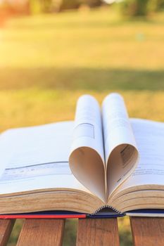 Close up book on table in morning time