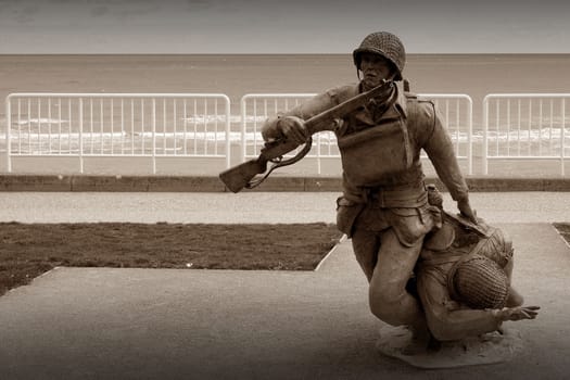 Statue representing two soldiers of allied forces during d-day landing