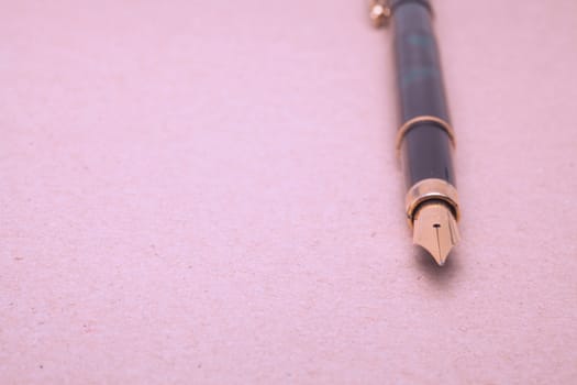 Vintage Fountain Pen on old paper background
