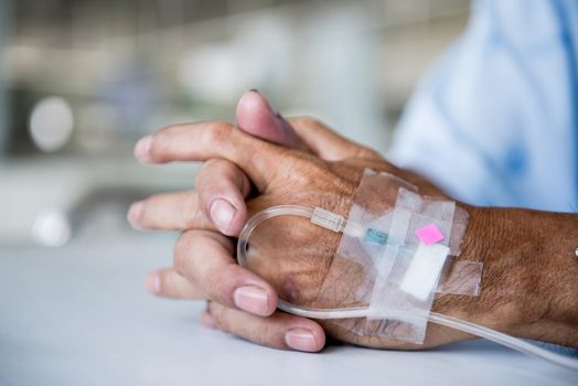 Patient with IV drip in a hospital