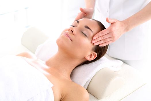 Portrait of a beautiful woman in a beauty salon, relaxation, luxury, peace.