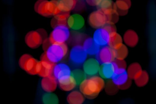 Out of focus multi color lights christmas background