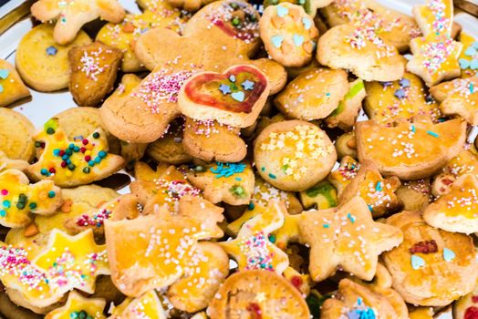 a pile of different homemade childrens christmas cookies