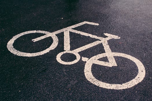 Bicycle sign on the road after the rain,Beijing