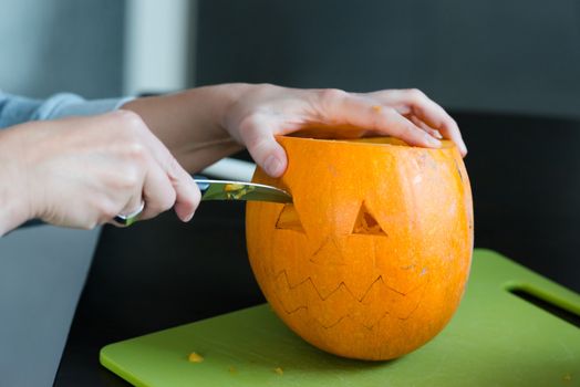 Halloween pumpkins Jack O'Lantern being carved for Halloween