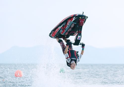 PATTAYA - DECEMBER 7: Alexyy Krivosheia from Russia competing during the freestyle competition of Thai Airway International Jet Ski World Cup at Jomtien Beach, Pattaya, Thailand on December 7, 2014.