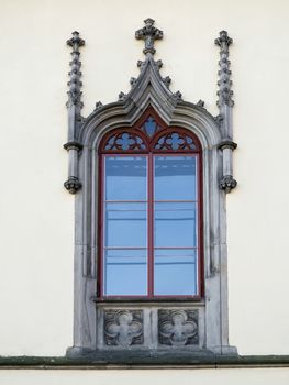 Detail of the Gothic window - Hruba Skala Castle - Czech republic.
Hruba Skala Castle (Rough Rock Castle) was build about 1350. The castle is on the edge of the rock mass in the Czech Paradise of about 20 meters high. It was built in Castle Rock built in the 13th century masters of Wallenstein. In 1859 the castle was rebuilded a romantic Neo-Gothic style. Hruba Skala Castle is a public national monument.