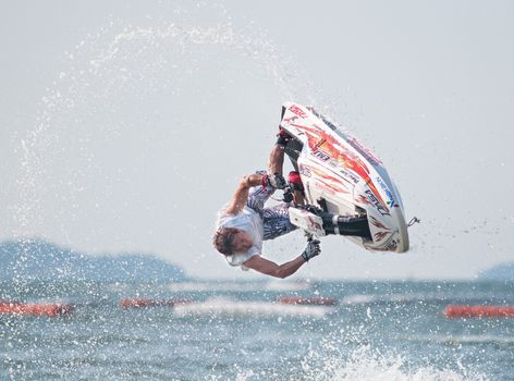 PATTAYA - DECEMBER 7: Veerapong Maneechom from Thailand competing during the freestyle competition of Thai Airway International Jet Ski World Cup at Jomtien Beach, Pattaya, Thailand on December 7, 2014.