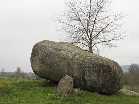 Rocking stones - logan stones or logans - are large stones that are so finely balanced that the application of just a small force causes them to rock. Typically, rocking stones either are residual corestones formed initially by spheroidal weathering and have been later been exposed by erosion or glacial erratics left by retreating glaciers. Natural rocking stones are found throughout the world. A few rocking stones might be man-made megaliths.