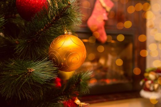 Christmas tree and in the interior with a fireplace
