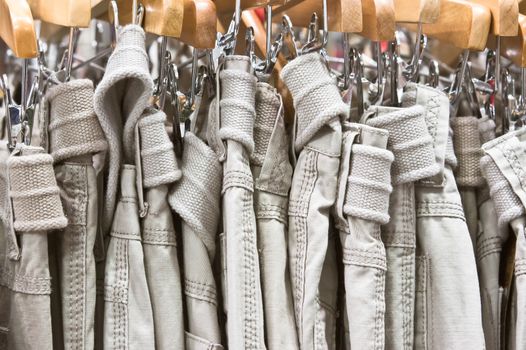 Casual men's trousers in a shop